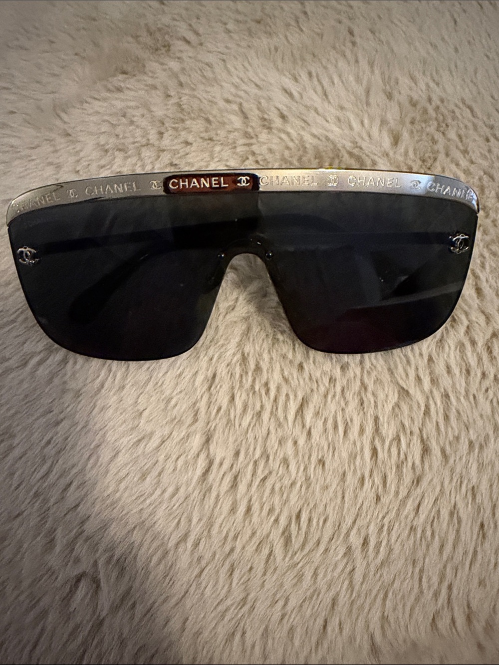 CHANEL Black Shield Sunglasses with Gold Logo Band